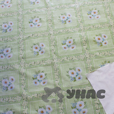 Клеенка тканая основа 125*25м 1 сорт 101/3 (ромашки, клетка) Тверь